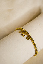 Pulseira dourada estrelas
