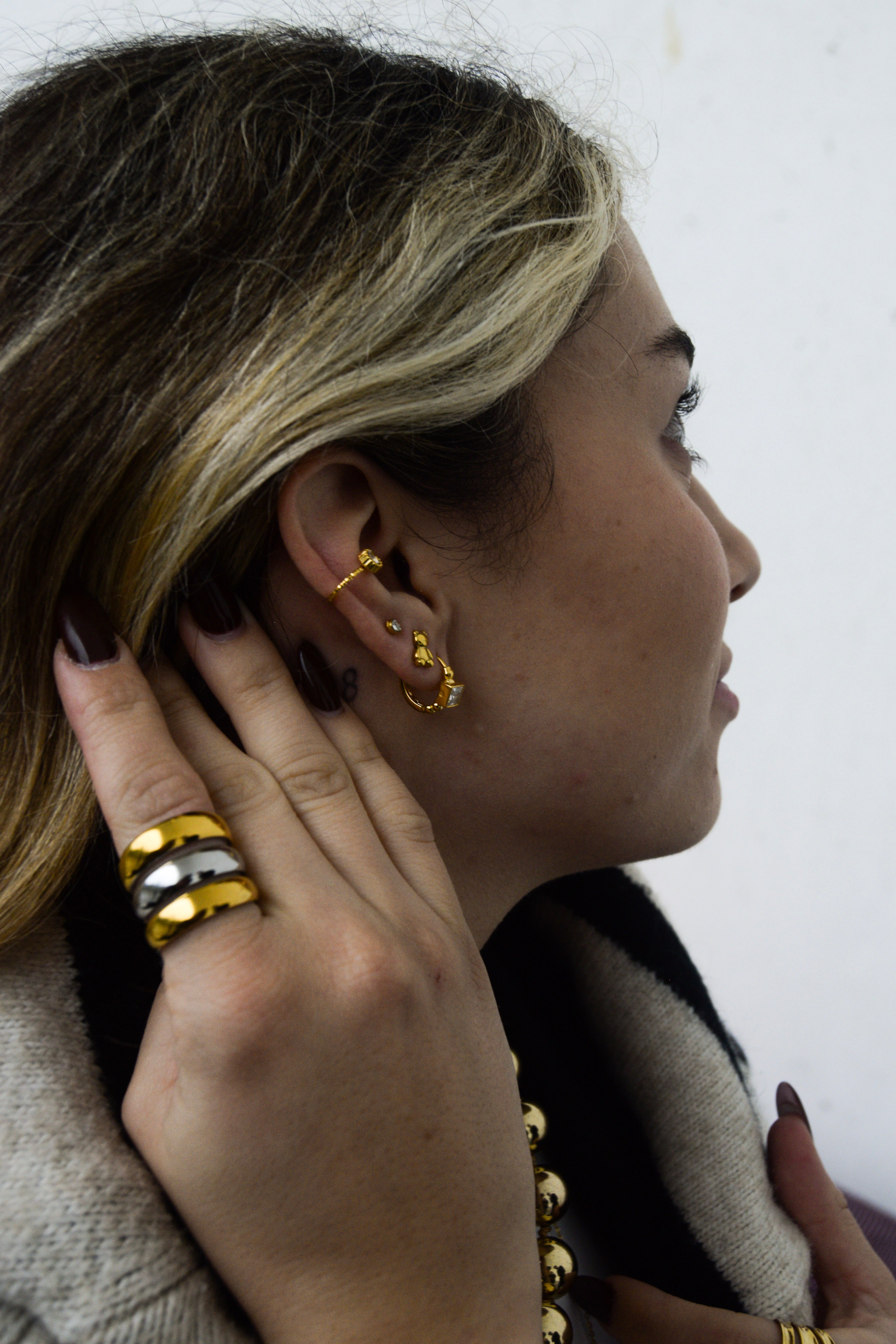 Anel triplo dourado e prateado