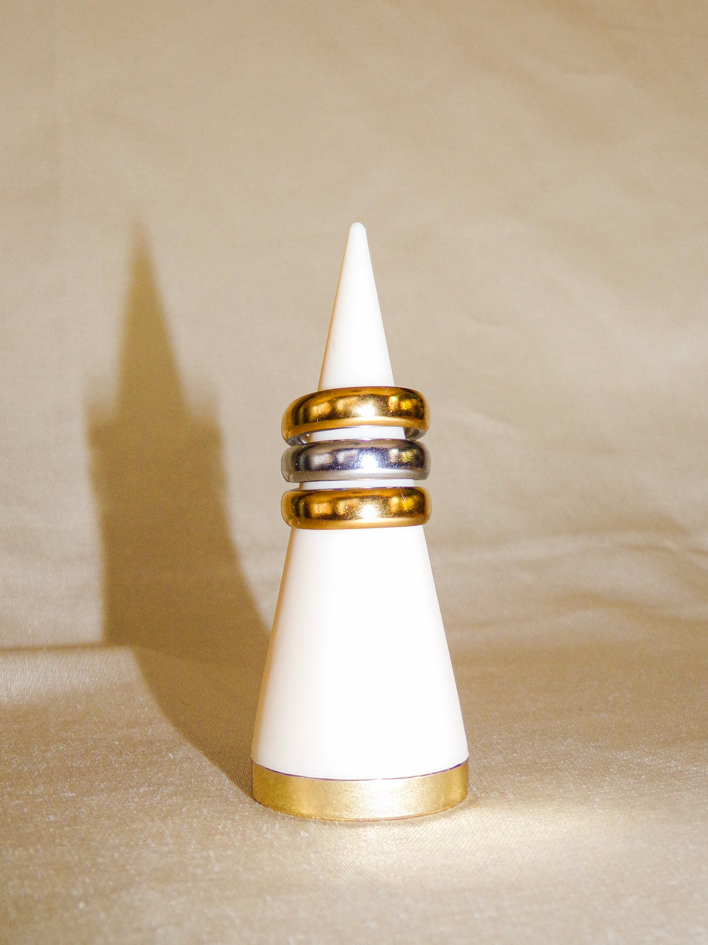 Anel triplo dourado e prateado