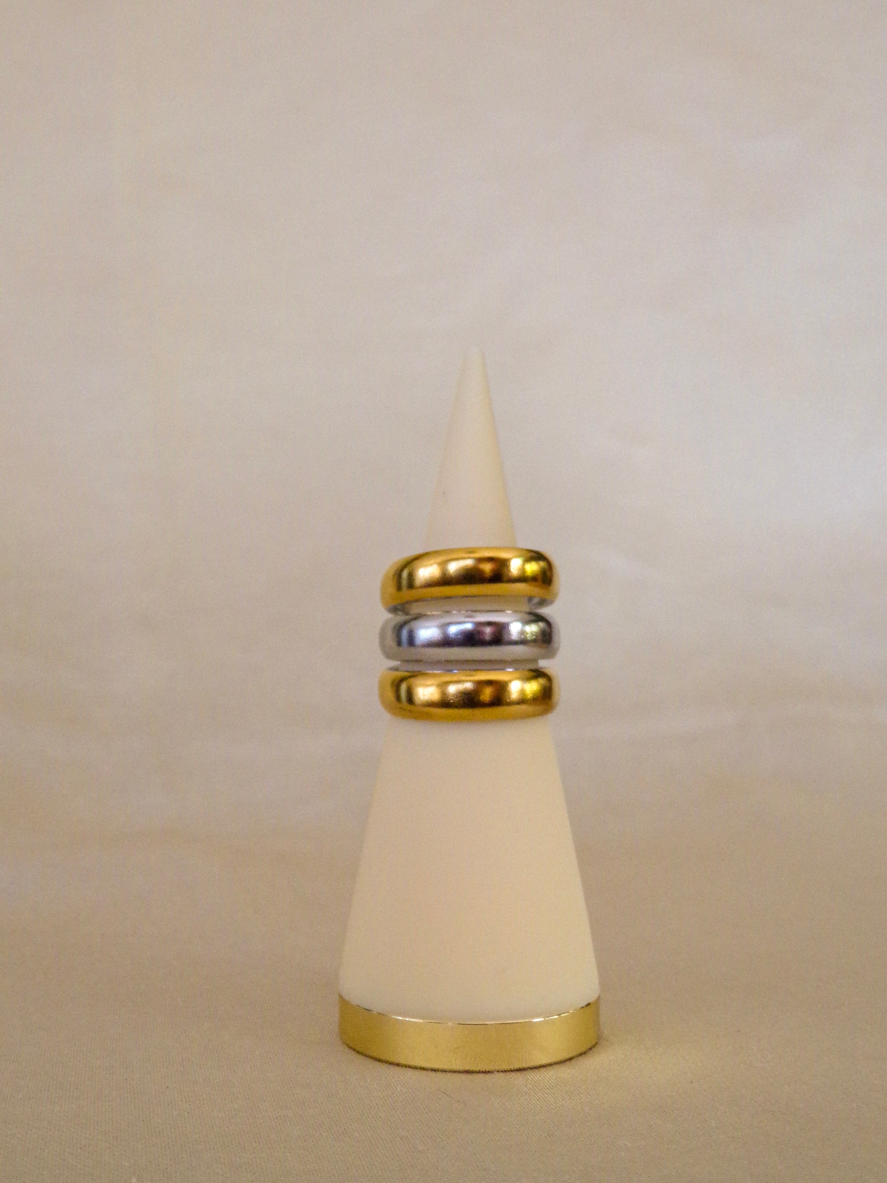 Anel triplo dourado e prateado