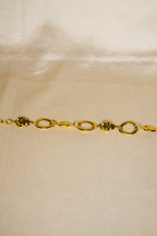 Pulseira dourada tachas grandes