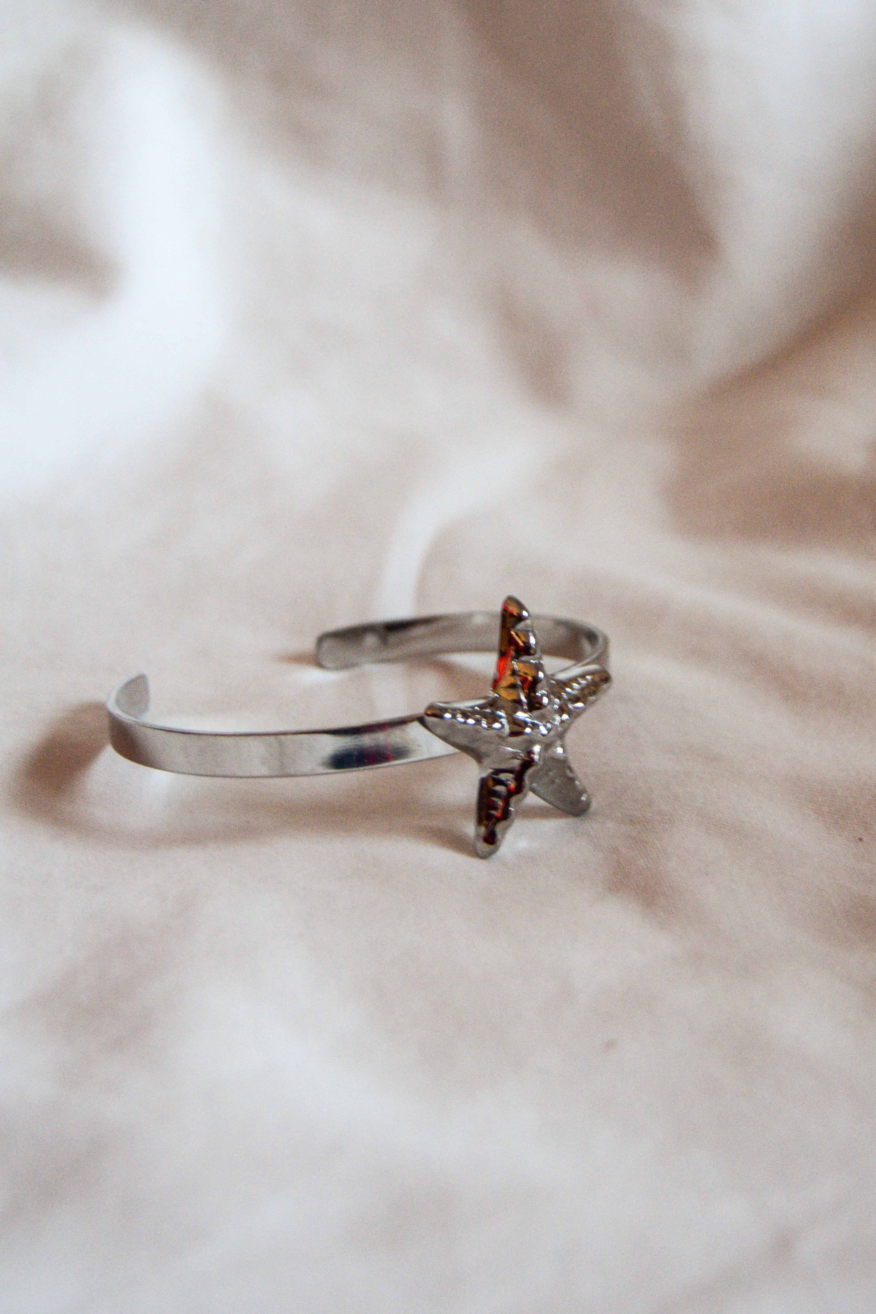 Pulseira prateada estrela