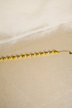 Pulseira dourada bolas grandes