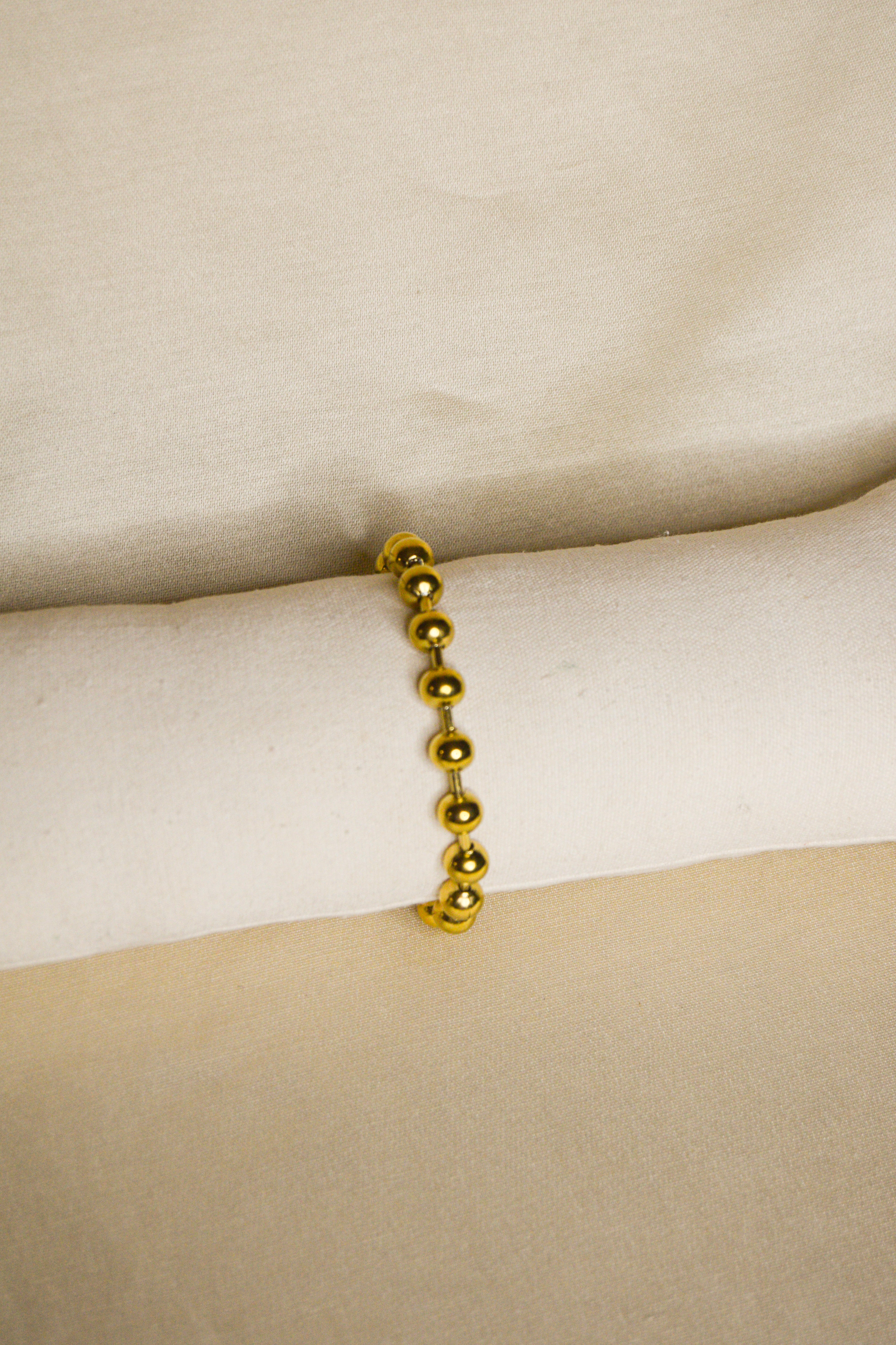 Pulseira dourada bolas grandes