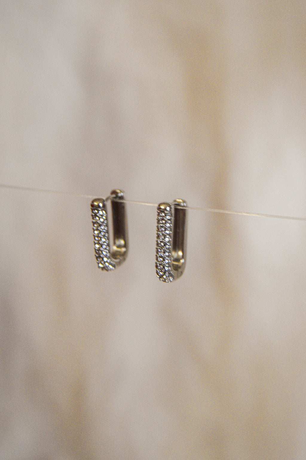 Argolas retangulares brilhantes