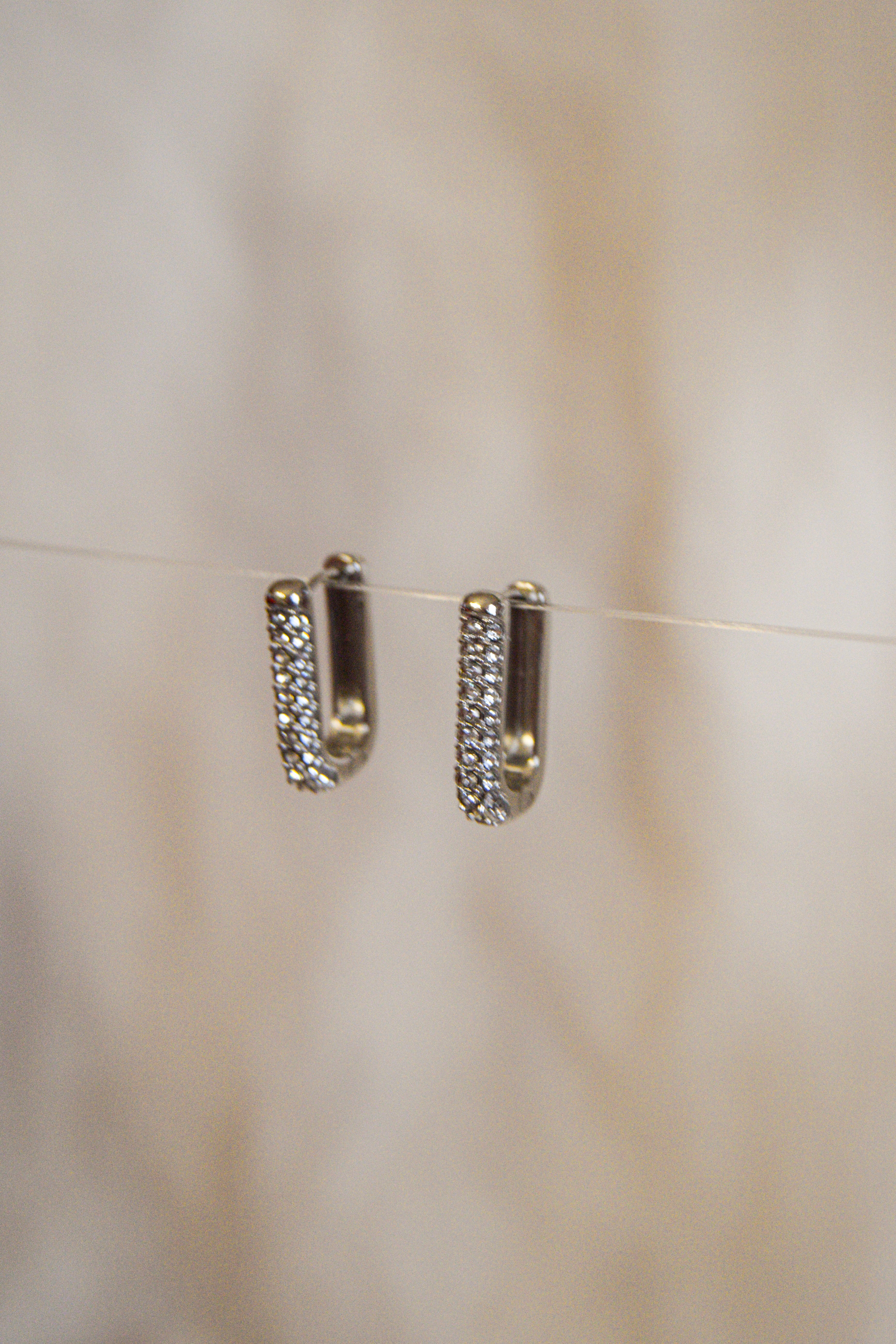 Argolas retangulares brilhantes