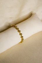 Pulseira dourada bolas grandes
