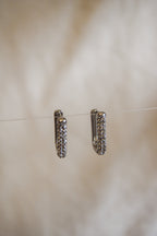 Argolas retangulares brilhantes