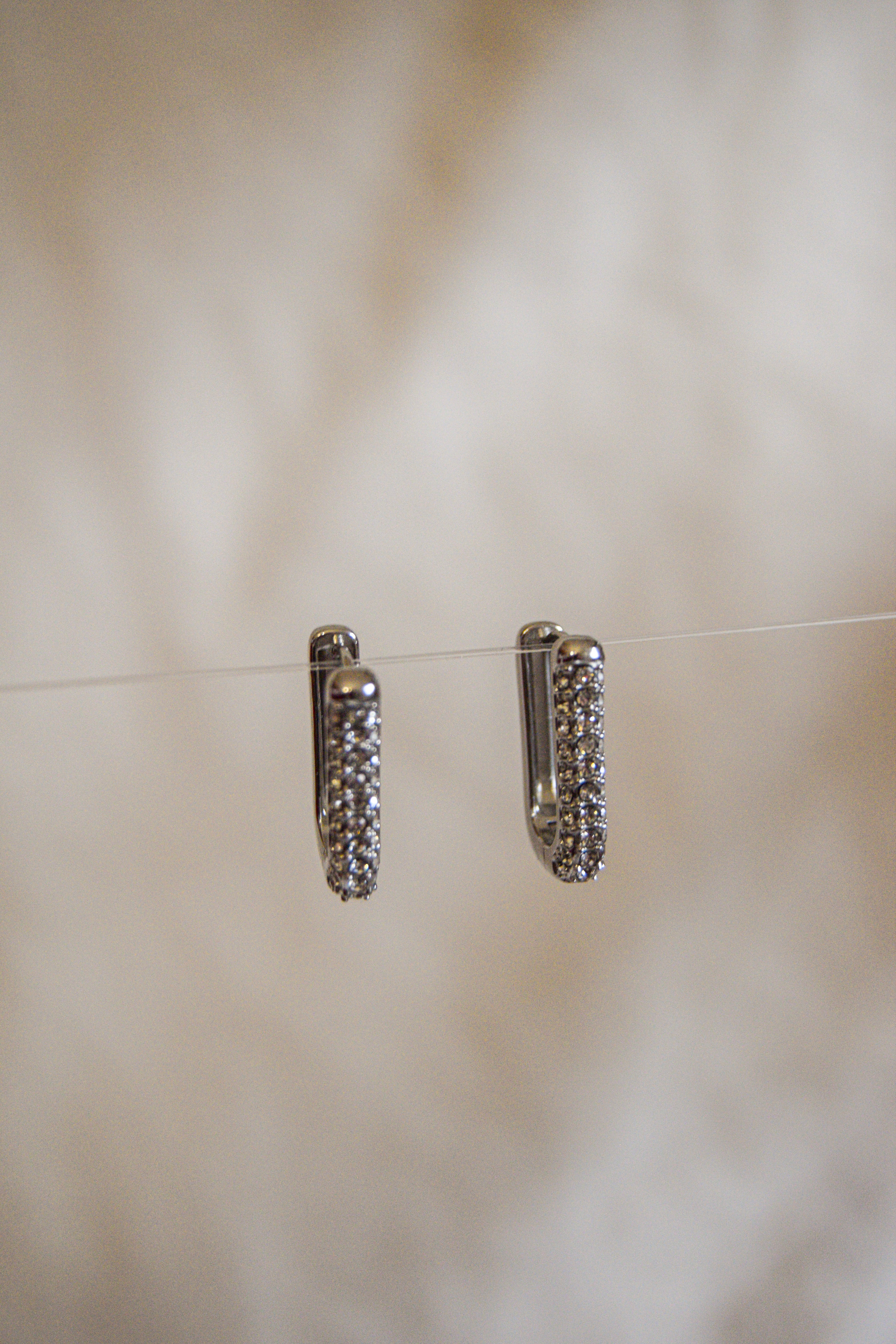 Argolas retangulares brilhantes