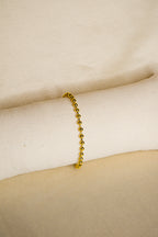 Pulseira dourada bolas pequenas