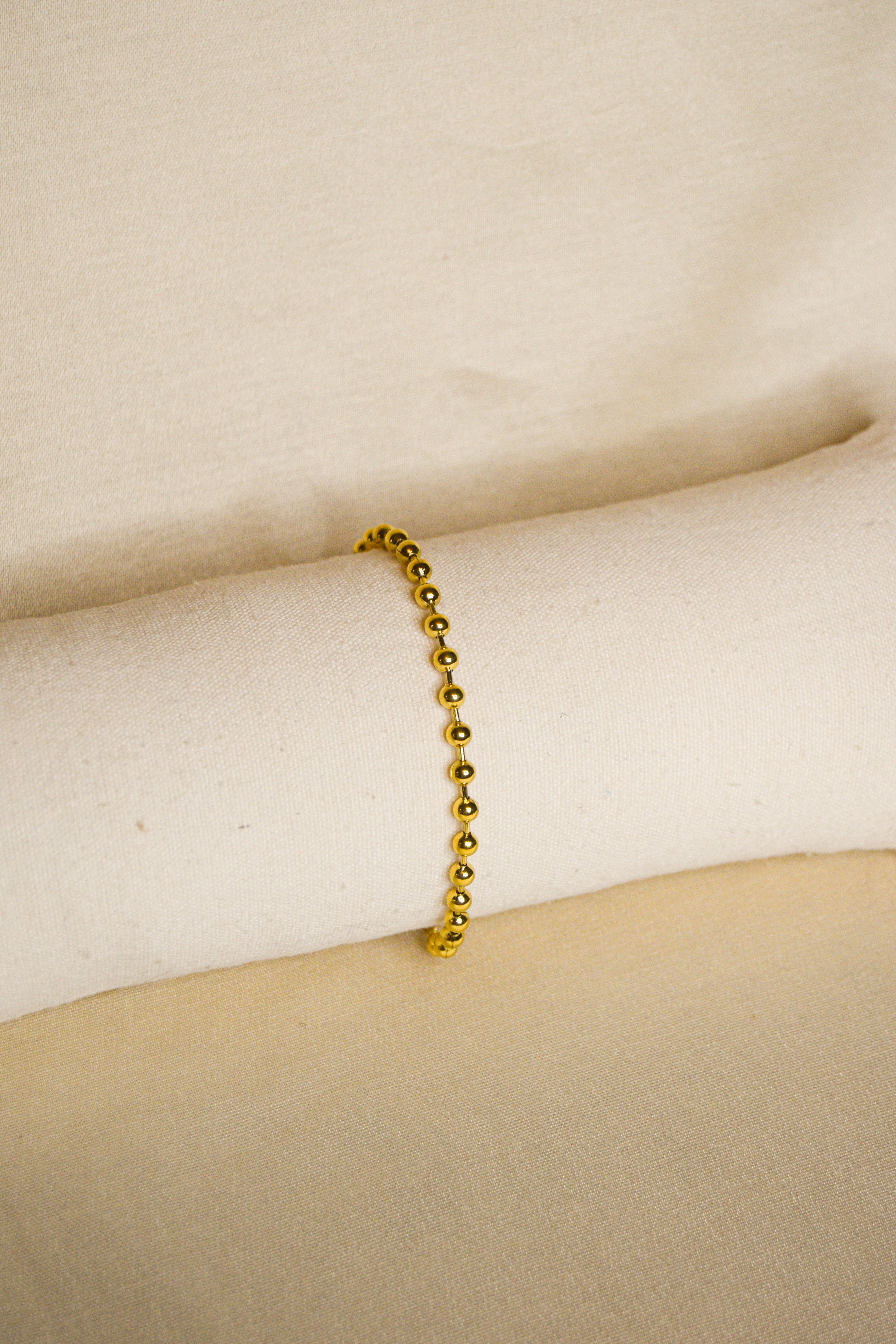 Pulseira dourada bolas pequenas