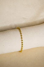 Pulseira dourada bolas pequenas
