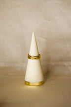 Anel dourado tranças