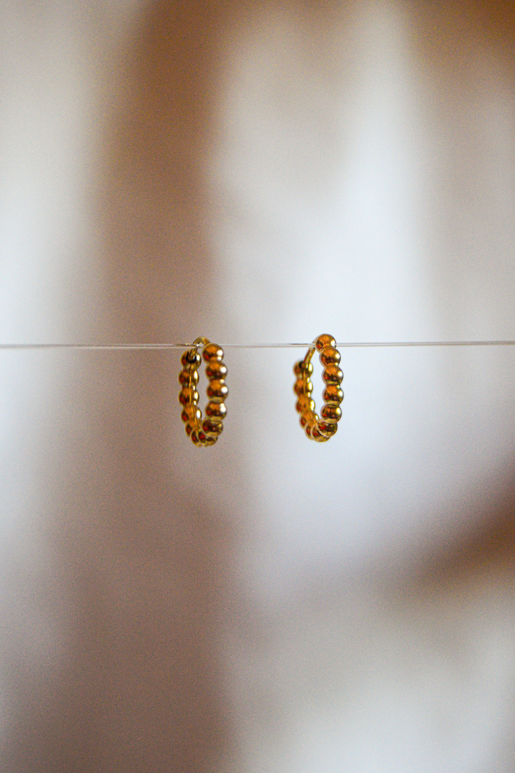 Argolas pequenas bolinhas