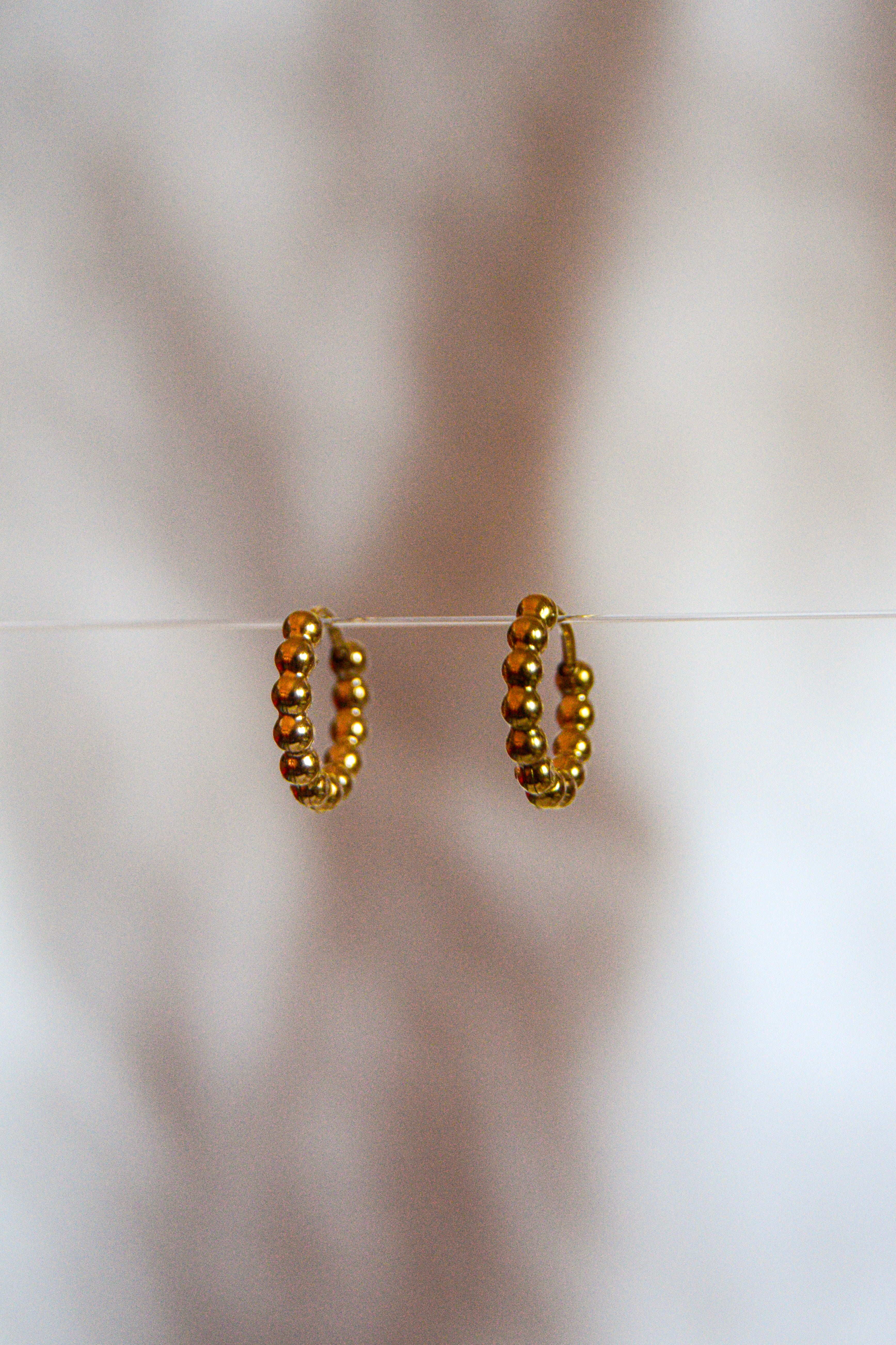 Argolas pequenas bolinhas