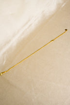 Pulseira dourada fina tranças