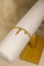 Pulseira dourada pendente Cornicello