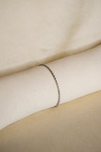 Pulseira prateada trança