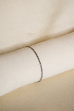 Pulseira prateada trança