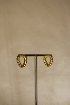 Argolas douradas bolas