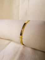 Pulseira dourada estilo Cartier