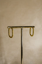 Argolas douradas trabalhadas