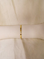 Pulseira dourada estilo Cartier