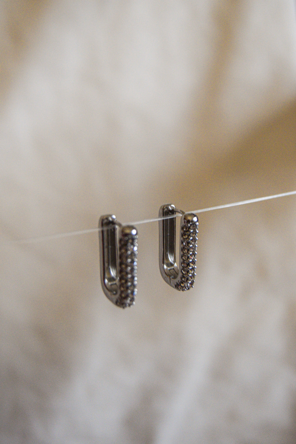 Argolas retangulares brilhantes