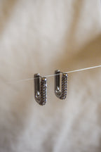 Argolas retangulares brilhantes