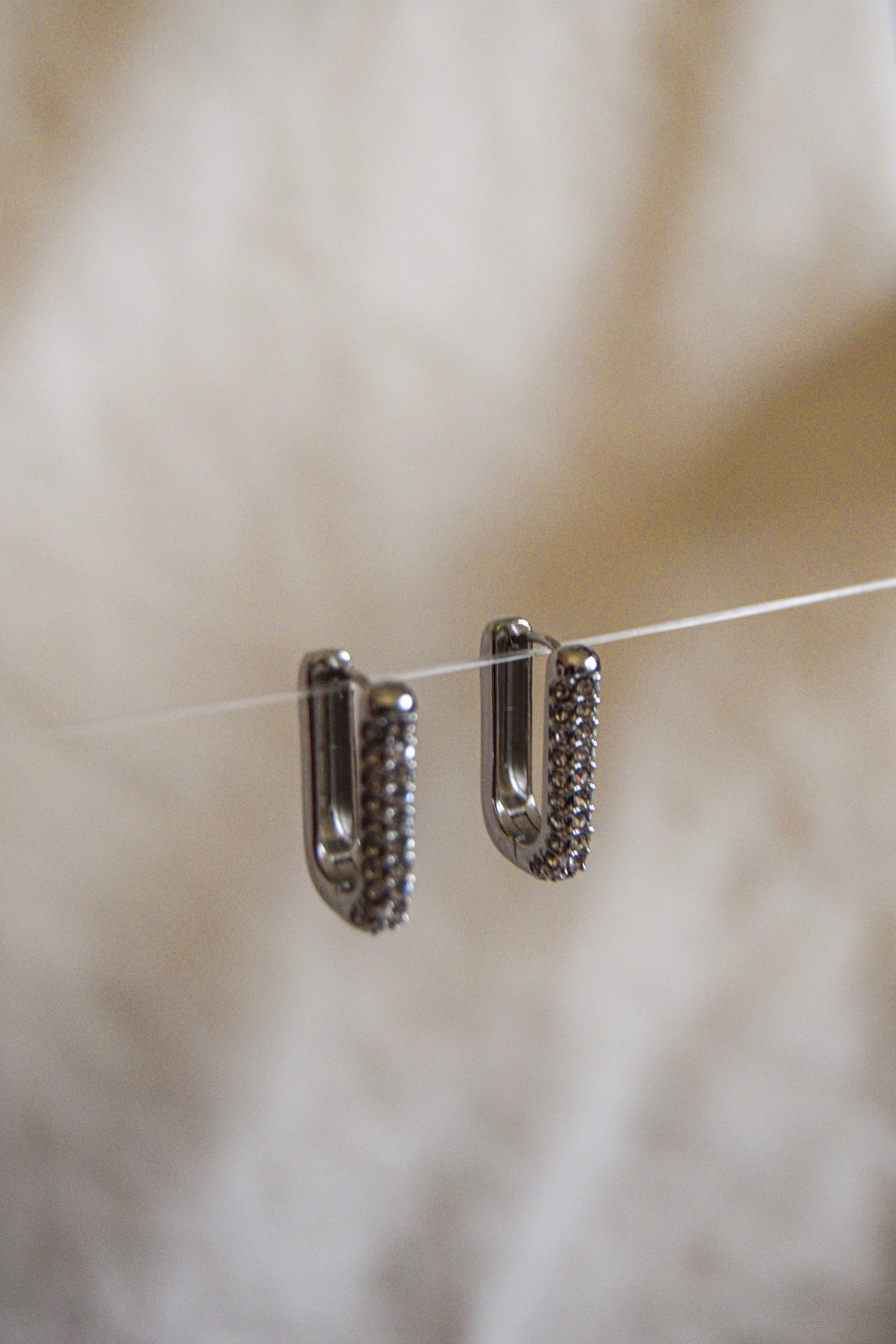 Argolas retangulares brilhantes