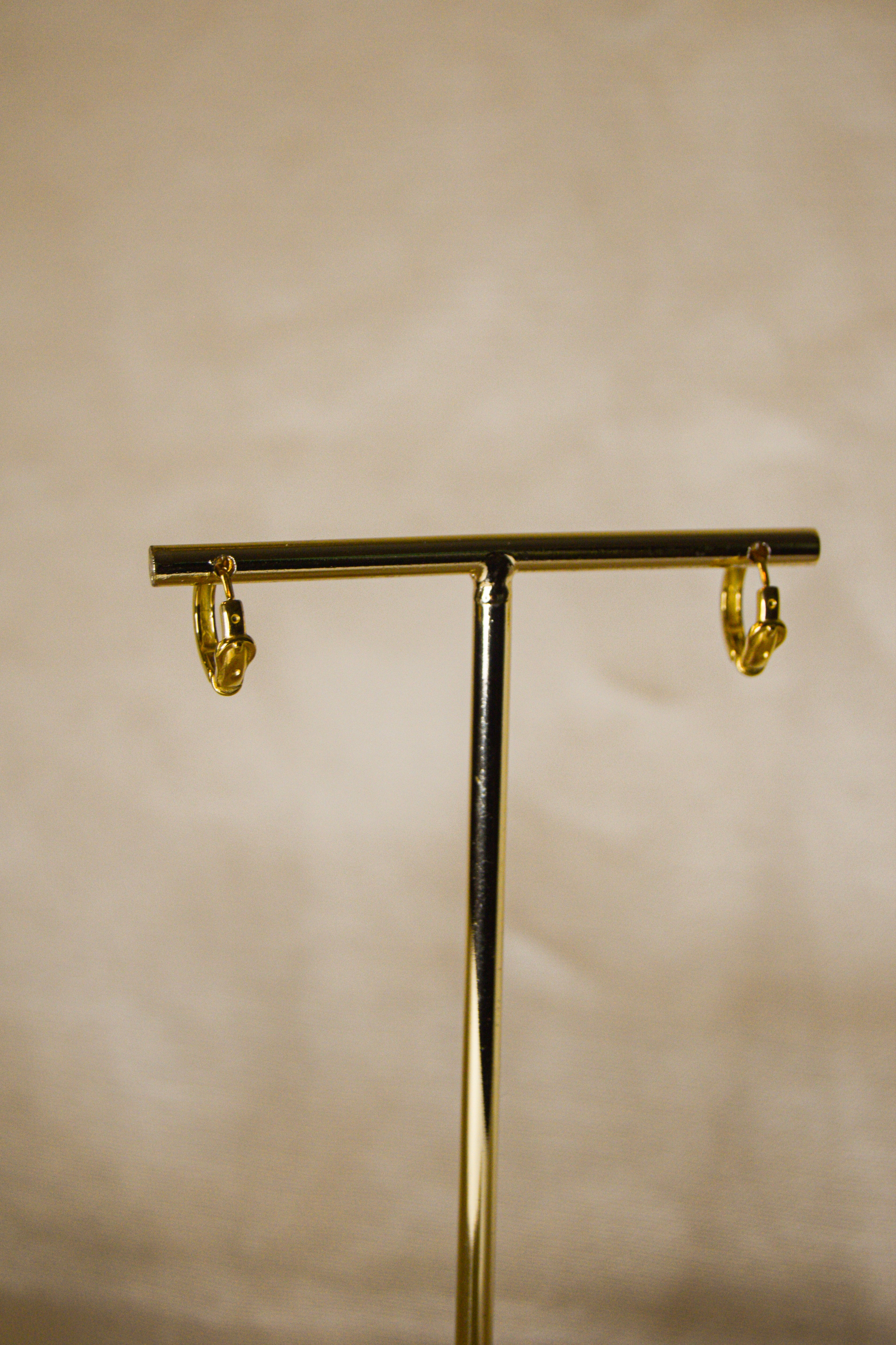 Argolas douradas cinto