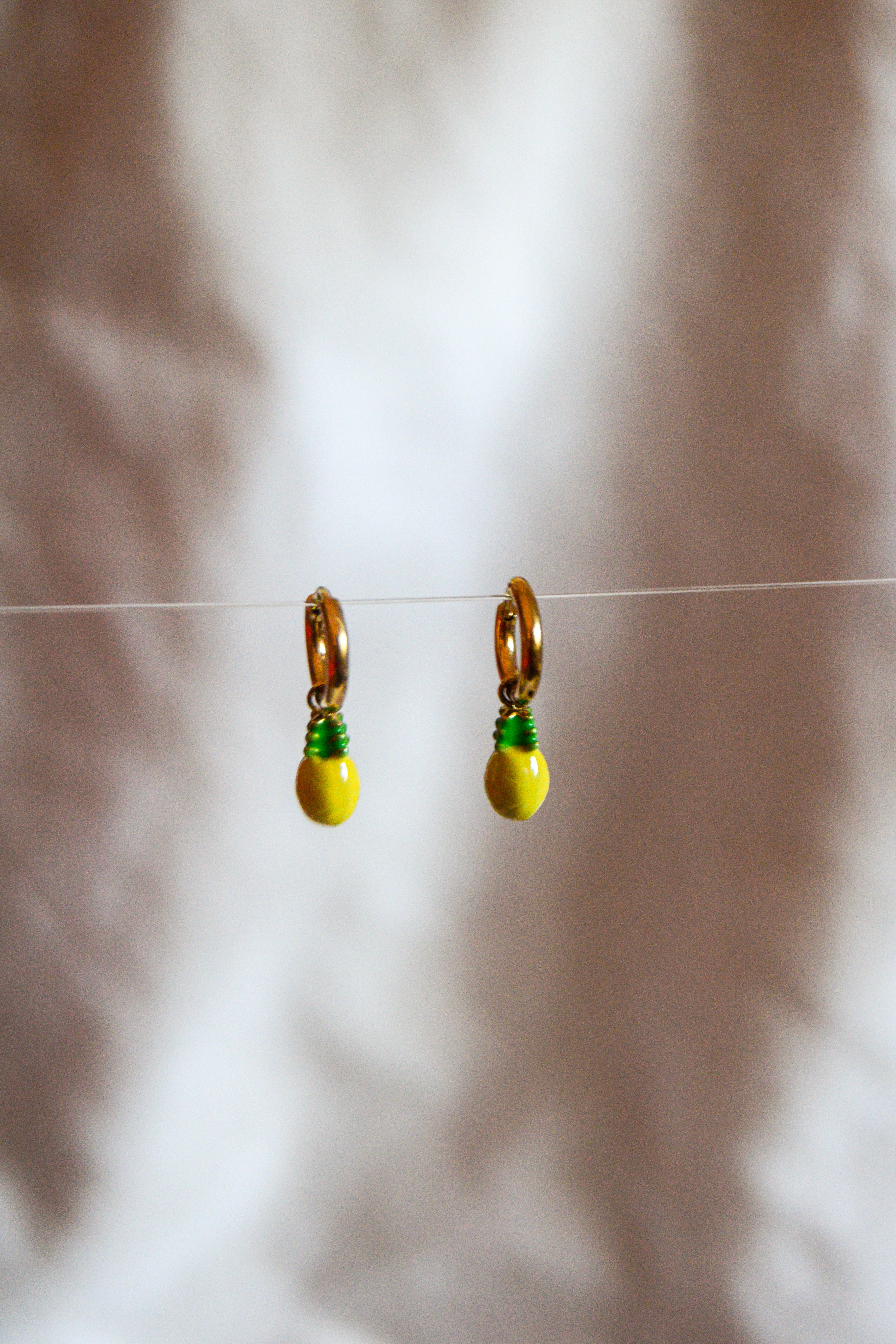 Argolas douradas abacaxi