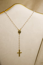 Terço dourado com cruz