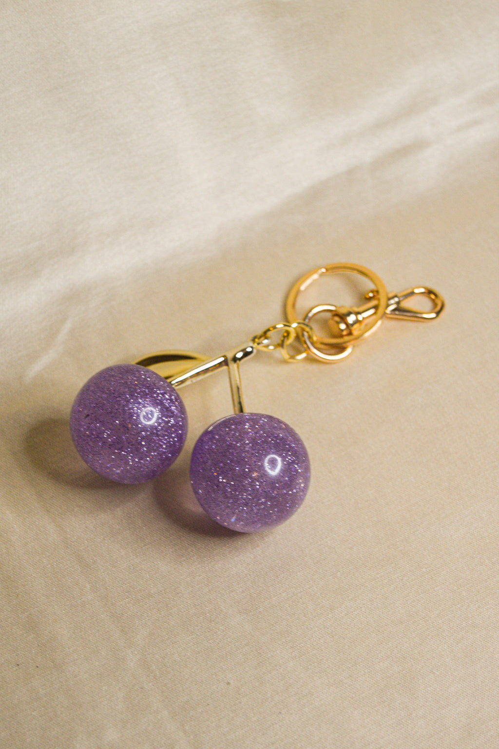 Porta-chaves cerejas roxas