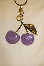 Porta-chaves cerejas roxas