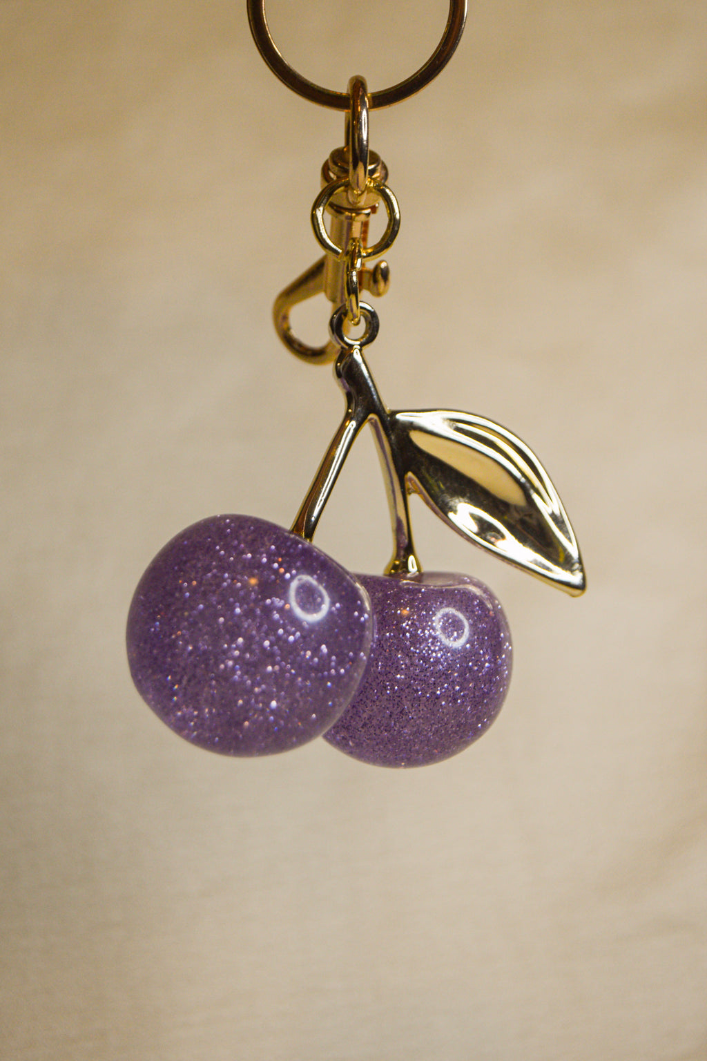 Porta-chaves cerejas roxas