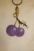 Porta-chaves cerejas roxas