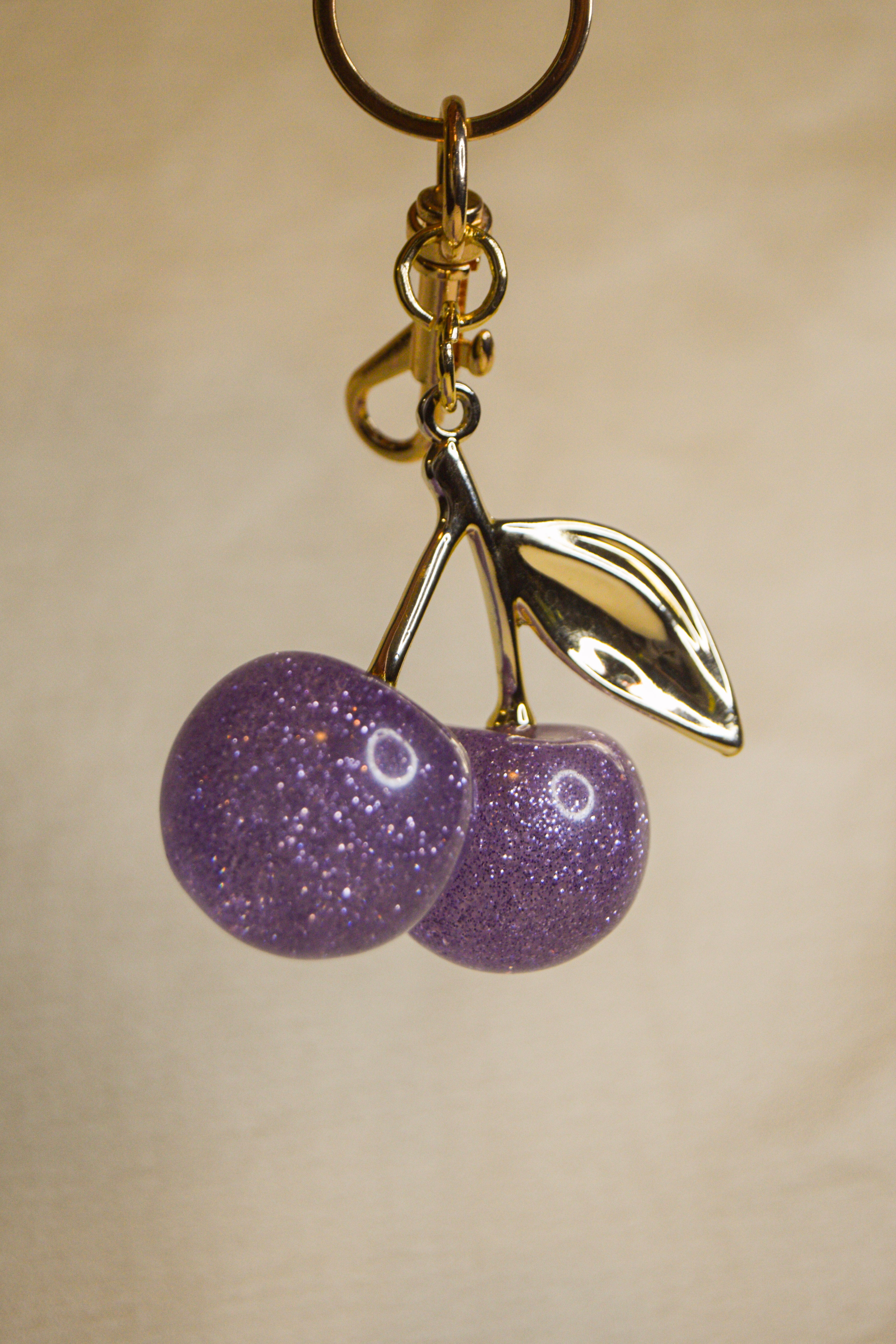 Porta-chaves cerejas roxas