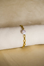 Pulseira dourada pérola